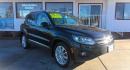 2016 BLACK Volkswagen Tiguan SE 4Motion (WVGBV7AX8GW) with an 2.0L L4 DOHC 16V TURBO engine, 6A transmission, located at 502 S. Riverside Avenue, Medford, OR, 97501, (541) 773-3136, 42.322803, -122.867477 - Photo#1