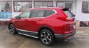 2019 RED Honda CR-V Touring AWD (5J6RW2H93KL) with an 1.5L L4 16V DOHC TURBO engine, CVT transmission, located at 502 S. Riverside Avenue, Medford, OR, 97501, (541) 773-3136, 42.322803, -122.867477 - Photo#2