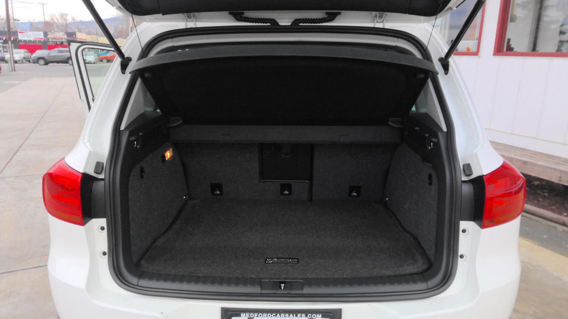 2014 WHITE Volkswagen Tiguan S (WVGAV3AX5EW) with an 2.0L L4 DOHC 16V TURBO engine, located at 502 S. Riverside Avenue, Medford, OR, 97501, (541) 773-3136, 42.322803, -122.867477 - Photo#5