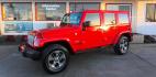 2018 RED Jeep Wrangler Unlimited Sahara 4WD (1C4BJWEG2JL) with an 3.6L V6 DOHC 24V FFV engine, located at 502 S. Riverside Avenue, Medford, OR, 97501, (541) 773-3136, 42.322803, -122.867477 - Photo#1