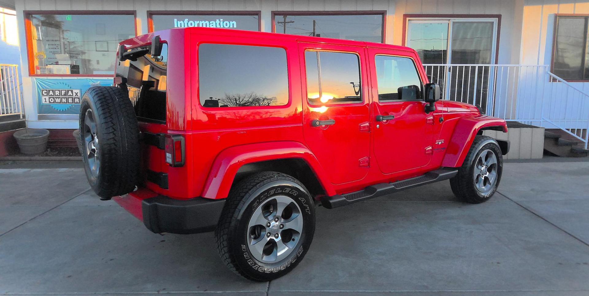 2018 RED Jeep Wrangler Unlimited Sahara 4WD (1C4BJWEG2JL) with an 3.6L V6 DOHC 24V FFV engine, located at 502 S. Riverside Avenue, Medford, OR, 97501, (541) 773-3136, 42.322803, -122.867477 - Photo#2