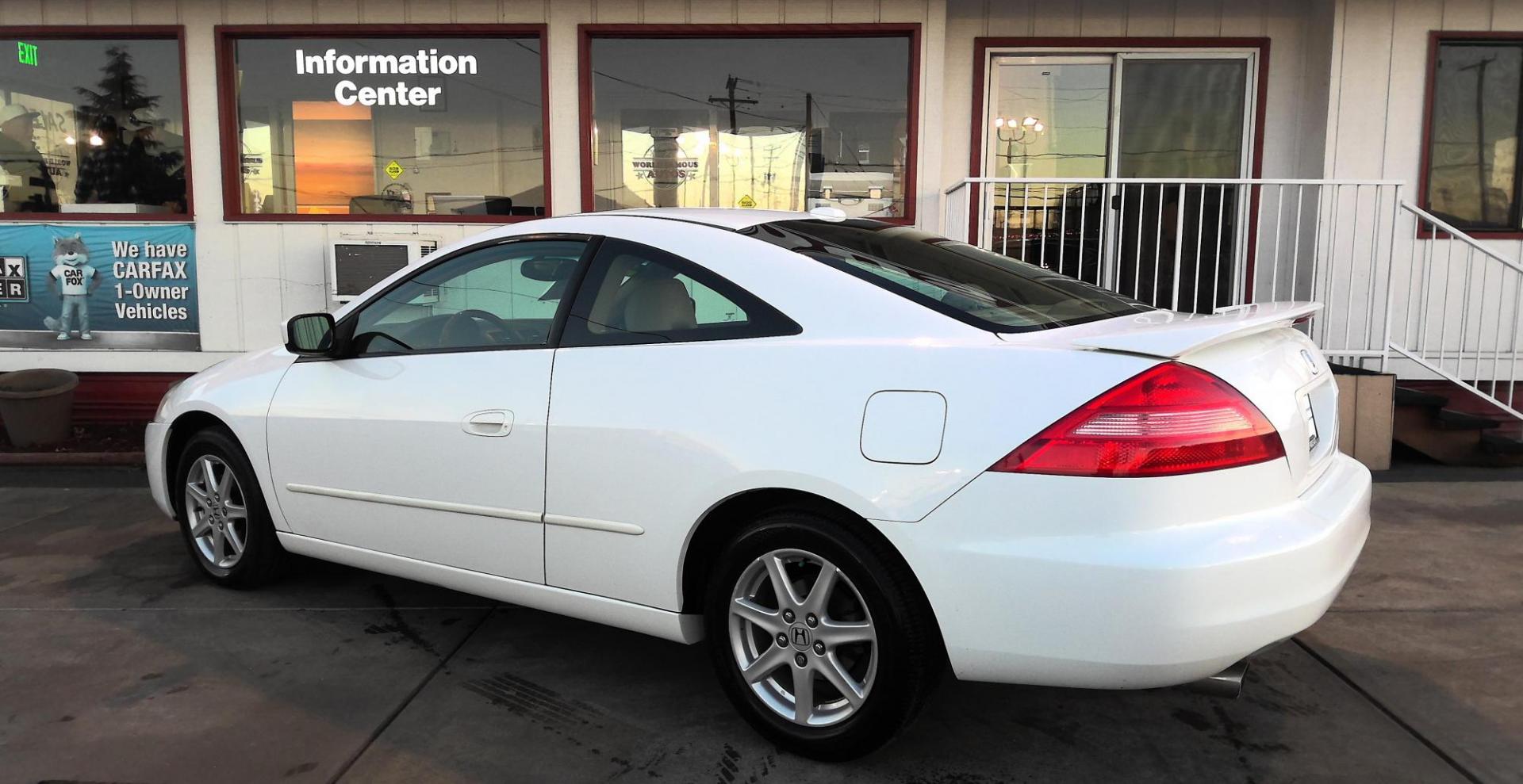 2004 WHITE Honda Accord EX V-6 Coupe AT with Navigation System and XM Radi (1HGCM82684A) with an 3.0L V6 SOHC 24V engine, 5-Speed Automatic Overdrive transmission, located at 502 S. Riverside Avenue, Medford, OR, 97501, (541) 773-3136, 42.322803, -122.867477 - Photo#2