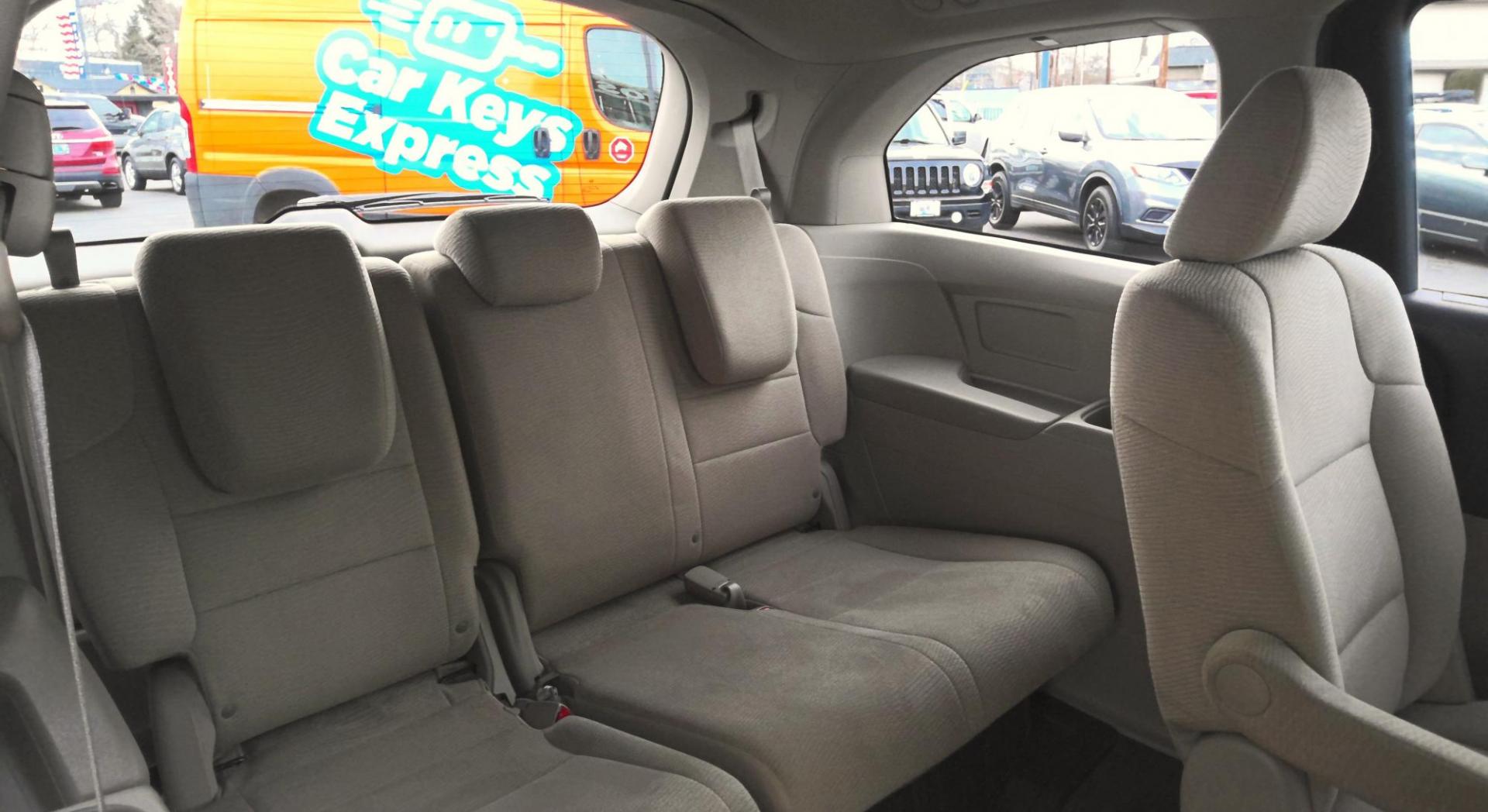 2012 MAROON Honda Odyssey LX (5FNRL5H27CB) with an 3.5L V6 SOHC 24V engine, 5-Speed Automatic transmission, located at 502 S. Riverside Avenue, Medford, OR, 97501, (541) 773-3136, 42.322803, -122.867477 - Photo#6