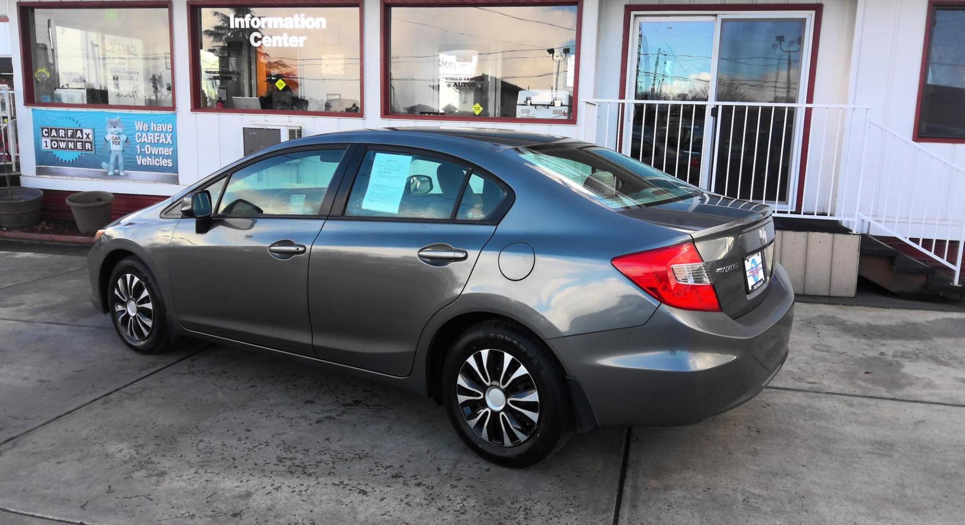 2012 GRAY Honda Civic LX Sedan 5-Speed AT (19XFB2F5XCE) with an 1.8L L4 SOHC 16V engine, 5-Speed Automatic transmission, located at 502 S. Riverside Avenue, Medford, OR, 97501, (541) 773-3136, 42.322803, -122.867477 - Photo#2