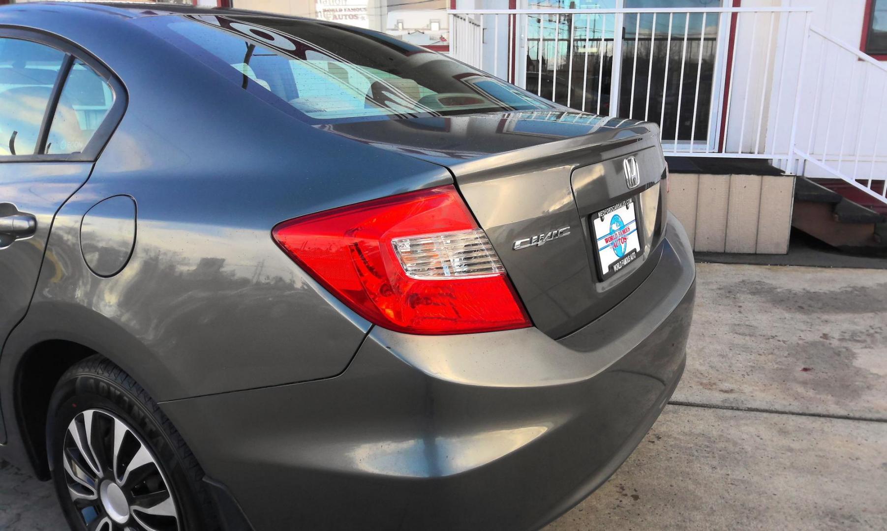 2012 GRAY Honda Civic LX Sedan 5-Speed AT (19XFB2F5XCE) with an 1.8L L4 SOHC 16V engine, 5-Speed Automatic transmission, located at 502 S. Riverside Avenue, Medford, OR, 97501, (541) 773-3136, 42.322803, -122.867477 - Photo#3