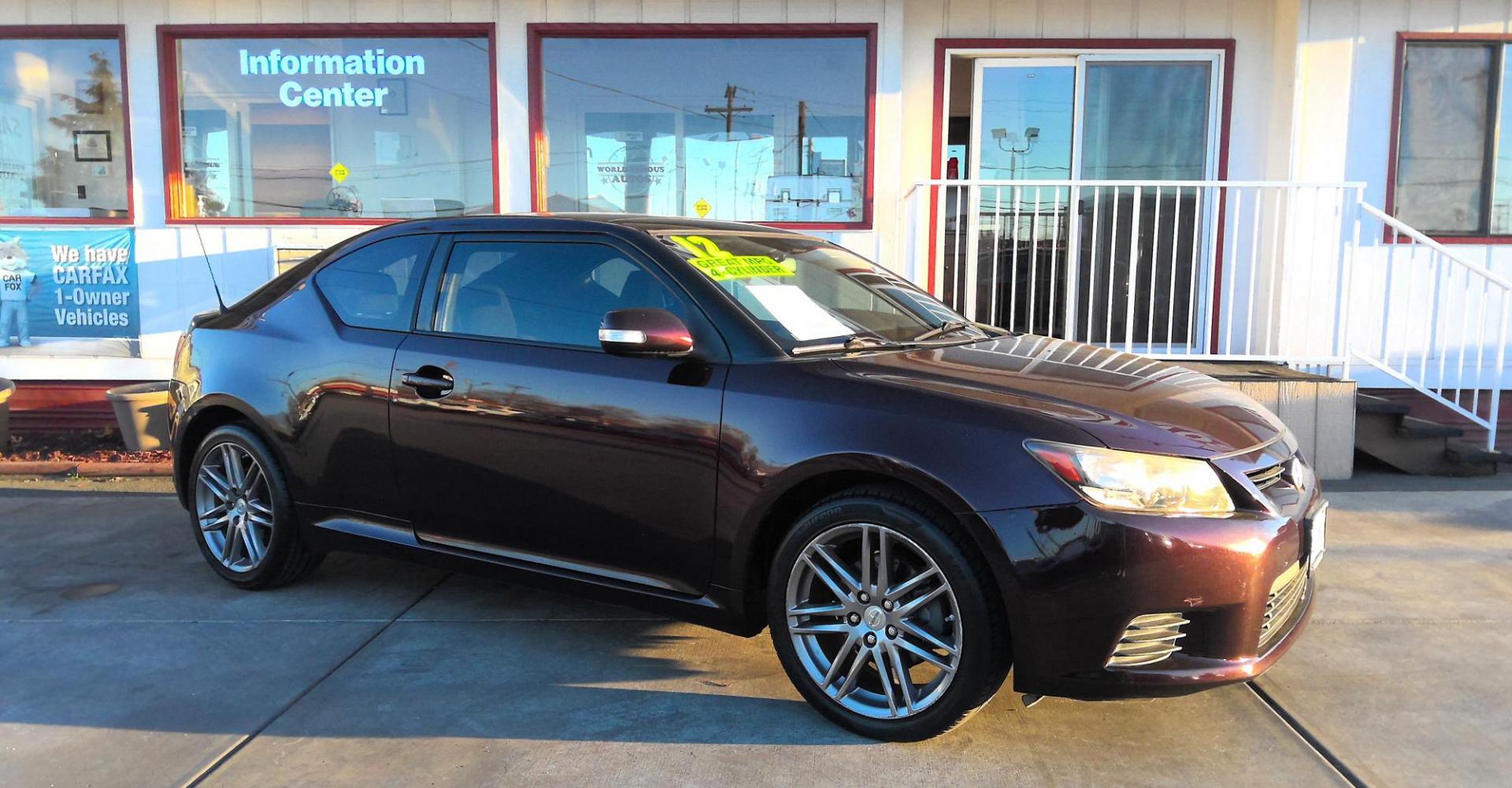 2012 MAROON Scion tC Sports Coupe 6-Spd AT (JTKJF5C76C3) with an 2.4L L4 DOHC 16V engine, 6-Speed Automatic transmission, located at 502 S. Riverside Avenue, Medford, OR, 97501, (541) 773-3136, 42.322803, -122.867477 - Photo#1