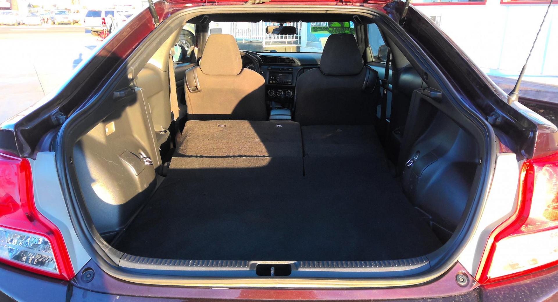 2012 MAROON Scion tC Sports Coupe 6-Spd AT (JTKJF5C76C3) with an 2.4L L4 DOHC 16V engine, 6-Speed Automatic transmission, located at 502 S. Riverside Avenue, Medford, OR, 97501, (541) 773-3136, 42.322803, -122.867477 - Photo#5