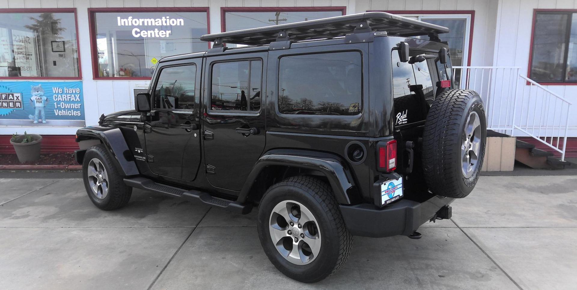 2016 BLACK Jeep Wrangler Unlimited Sahara 4WD (1C4BJWEG1GL) with an 3.6L V6 DOHC 24V FFV engine, located at 502 S. Riverside Avenue, Medford, OR, 97501, (541) 773-3136, 42.322803, -122.867477 - Photo#2