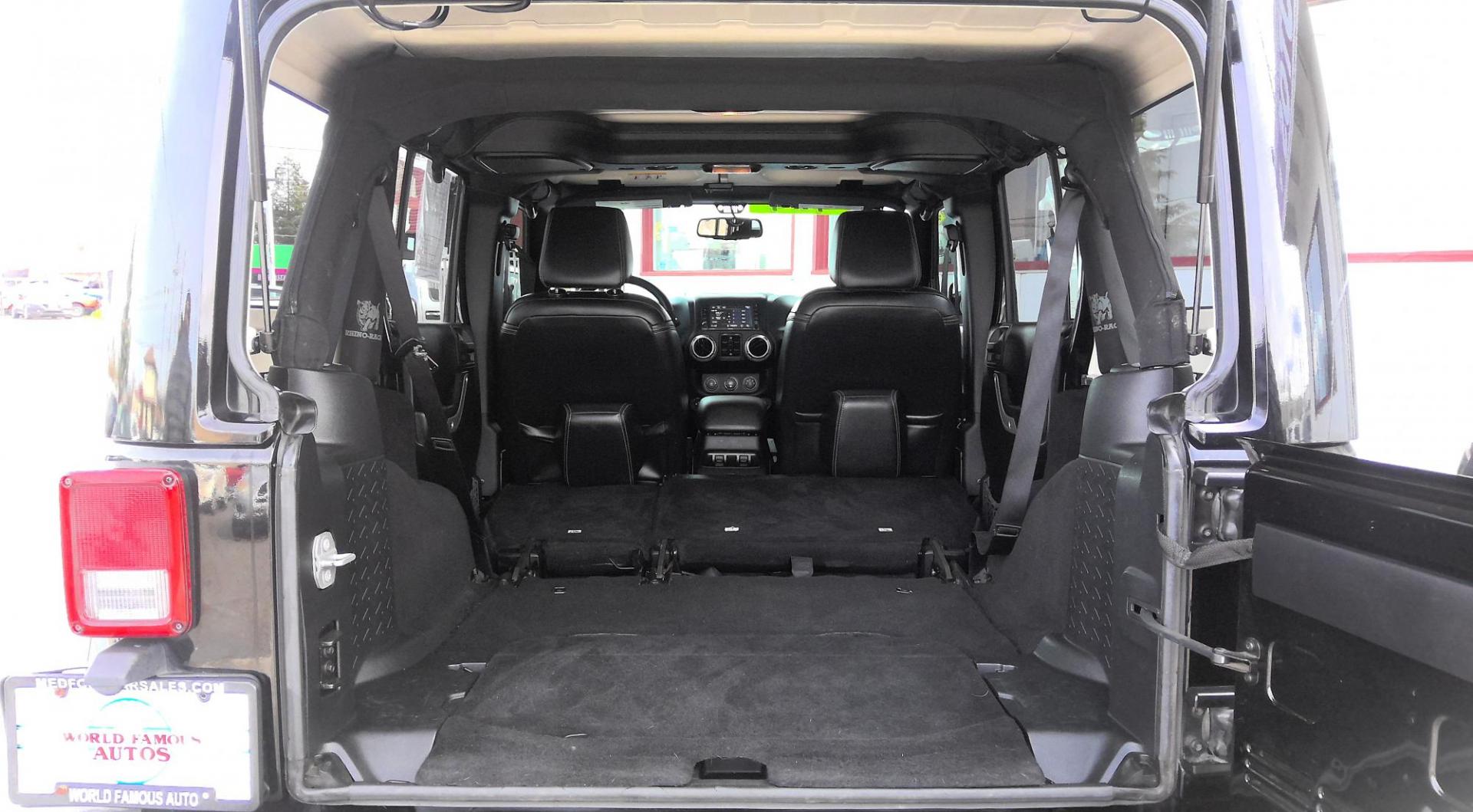 2016 BLACK Jeep Wrangler Unlimited Sahara 4WD (1C4BJWEG1GL) with an 3.6L V6 DOHC 24V FFV engine, located at 502 S. Riverside Avenue, Medford, OR, 97501, (541) 773-3136, 42.322803, -122.867477 - Photo#4