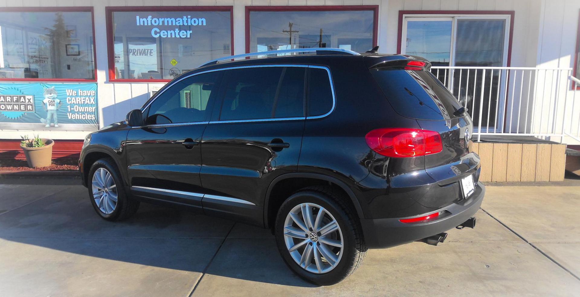 2012 BLACK Volkswagen Tiguan S (WVGAV7AX2CW) with an 2.0L L4 DOHC 16V TURBO engine, located at 502 S. Riverside Avenue, Medford, OR, 97501, (541) 773-3136, 42.322803, -122.867477 - Photo#2