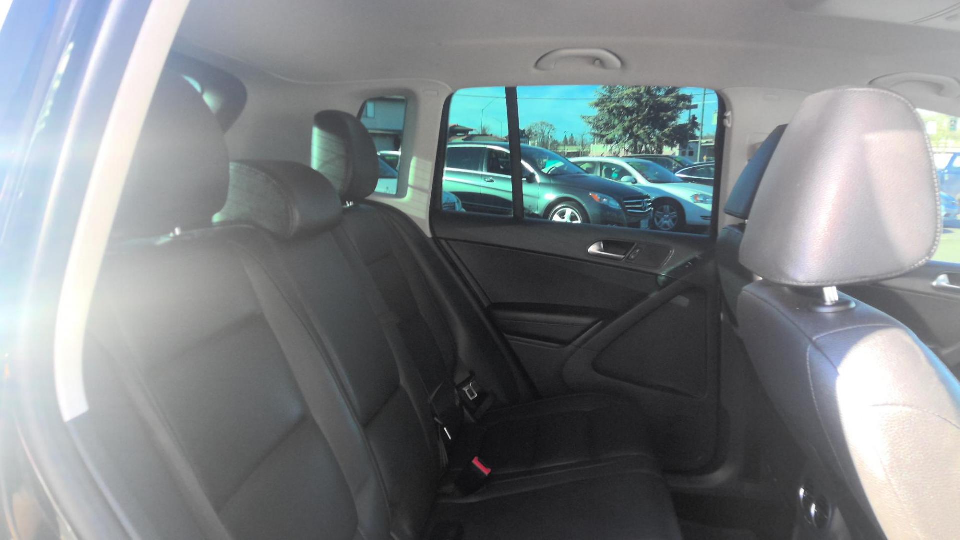 2012 BLACK Volkswagen Tiguan S (WVGAV7AX2CW) with an 2.0L L4 DOHC 16V TURBO engine, located at 502 S. Riverside Avenue, Medford, OR, 97501, (541) 773-3136, 42.322803, -122.867477 - Photo#4