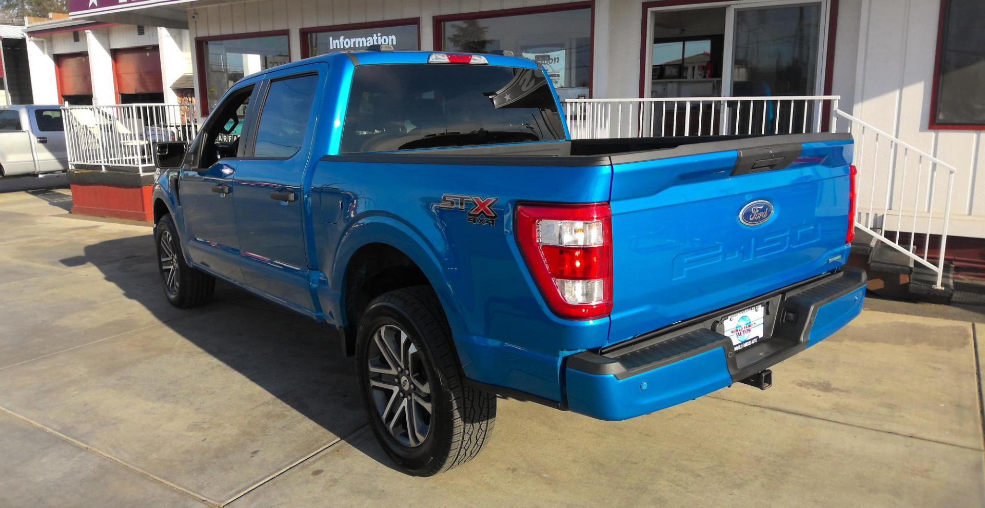 2021 BLUE Ford F-150 Lariat SuperCrew 5.5-ft. Bed 4WD (1FTFW1E84MF) with an 4.6L V8 SOHC 24V engine, located at 502 S. Riverside Avenue, Medford, OR, 97501, (541) 773-3136, 42.322803, -122.867477 - Photo#2