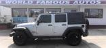 2010 SILVER Jeep Wrangler Unlimited Sport 4WD (1J4HA3H15AL) with an 3.8L V6 OHV 12V engine, located at 502 S. Riverside Avenue, Medford, OR, 97501, (541) 773-3136, 42.322803, -122.867477 - Photo#0