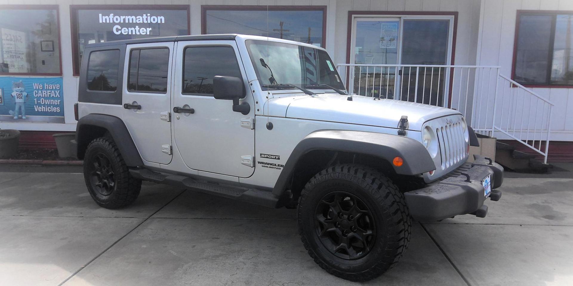 2010 SILVER Jeep Wrangler Unlimited Sport 4WD (1J4HA3H15AL) with an 3.8L V6 OHV 12V engine, located at 502 S. Riverside Avenue, Medford, OR, 97501, (541) 773-3136, 42.322803, -122.867477 - Photo#1