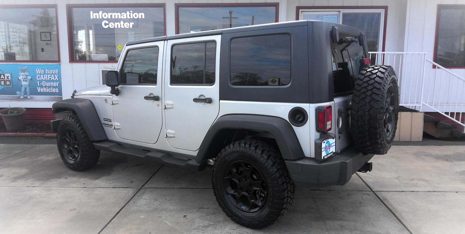 2010 SILVER Jeep Wrangler Unlimited Sport 4WD (1J4HA3H15AL) with an 3.8L V6 OHV 12V engine, located at 502 S. Riverside Avenue, Medford, OR, 97501, (541) 773-3136, 42.322803, -122.867477 - Photo#2