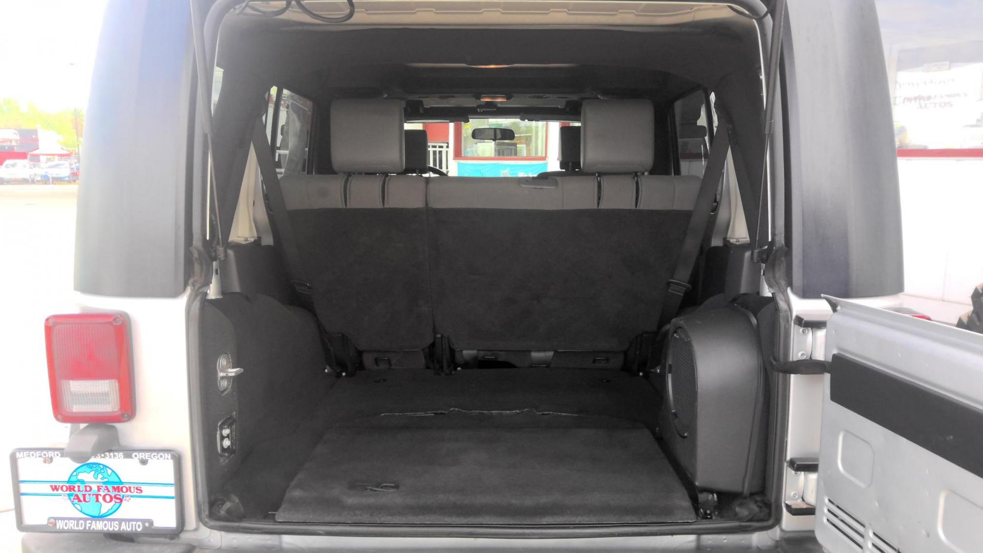 2010 SILVER Jeep Wrangler Unlimited Sport 4WD (1J4HA3H15AL) with an 3.8L V6 OHV 12V engine, located at 502 S. Riverside Avenue, Medford, OR, 97501, (541) 773-3136, 42.322803, -122.867477 - Photo#3