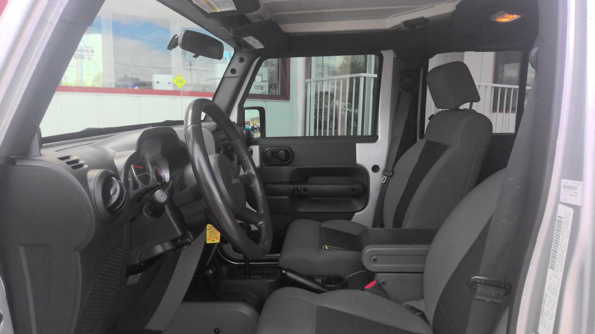 2010 SILVER Jeep Wrangler Unlimited Sport 4WD (1J4HA3H15AL) with an 3.8L V6 OHV 12V engine, located at 502 S. Riverside Avenue, Medford, OR, 97501, (541) 773-3136, 42.322803, -122.867477 - Photo#5