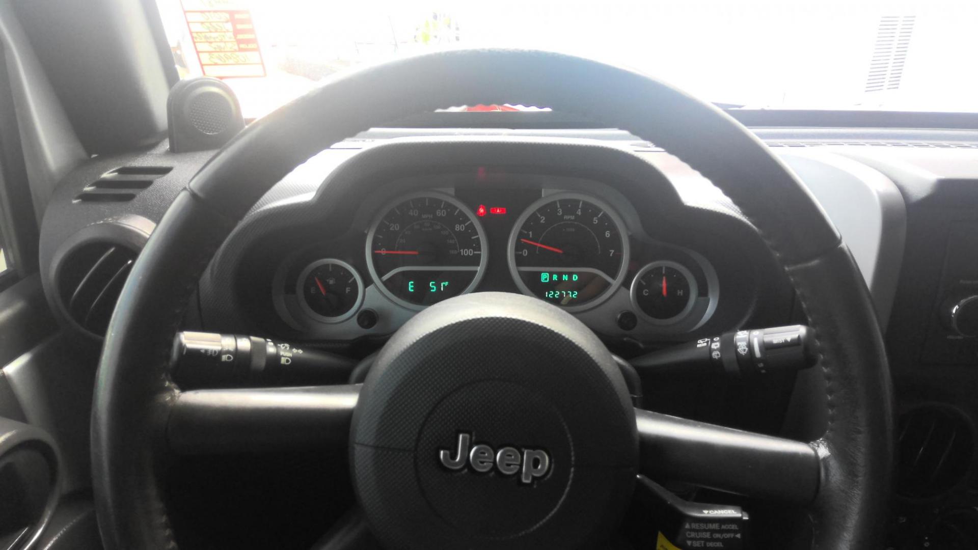 2010 SILVER Jeep Wrangler Unlimited Sport 4WD (1J4HA3H15AL) with an 3.8L V6 OHV 12V engine, located at 502 S. Riverside Avenue, Medford, OR, 97501, (541) 773-3136, 42.322803, -122.867477 - Photo#8