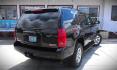 2007 BLACK GMC Yukon 4WD (1GKFK13047R) with an 5.3L V8 OHV 16V FFV engine, 4-Speed Automatic Overdrive transmission, located at 502 S. Riverside Avenue, Medford, OR, 97501, (541) 773-3136, 42.322803, -122.867477 - Photo#2