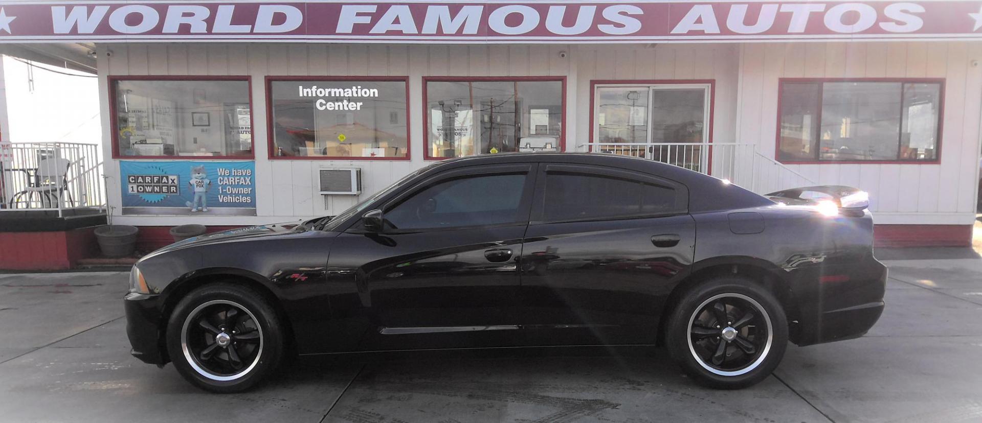 2013 BLACK Dodge Charger SXT (2C3CDXHG6DH) with an 3.6L V6 DOHC 24V engine, 5-Speed Automatic transmission, located at 502 S. Riverside Avenue, Medford, OR, 97501, (541) 773-3136, 42.322803, -122.867477 - Photo#0