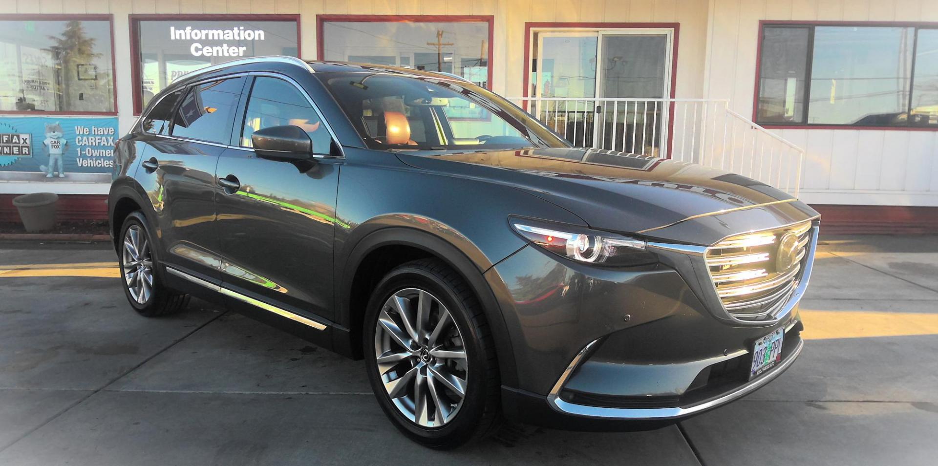 2018 GRAY /Red Mazda CX-9 Signature AWD (JM3TCBEYXJ0) with an 2.5L L4 DOHC 16V engine, 6A transmission, located at 502 S. Riverside Avenue, Medford, OR, 97501, (541) 773-3136, 42.322803, -122.867477 - This 2018 Mazda CX-9 Signature is a great 1-Owner SUV with clean Carfax Vehicle History and maintenance records. Get around the Rogue Valley in all kinds of weather with AWD and good fuel economy for it's class thanks to it's 2.5L 4-cyl engine, and with low miles - less than 90k! - Photo#1