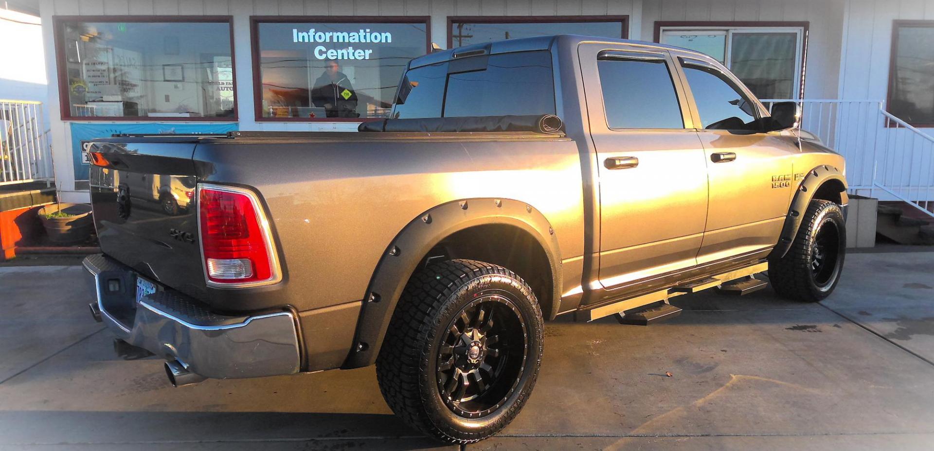 2014 GRAY /Black RAM 1500 Laramie Crew Cab SWB 4WD (1C6RR7NT0ES) with an 5.7L V8 OHV 16V engine, 6-Speed Automatic transmission, located at 502 S. Riverside Avenue, Medford, OR, 97501, (541) 773-3136, 42.322803, -122.867477 - This 5.7L V8 HEMI Dodge Ram Laramie pickup truck is an awesome 4x4 truck. INCLUDES: Leather-trimmed heated & cooled seats, heavy-duty engine cooling, trailer tow package, power mirrors, remote start, and more. - Photo#2