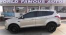 2018 GOLD Ford Escape Titanium 4WD (1FMCU9J96JU) with an 2.0L L4 DOHC 16V engine, 6A transmission, located at 502 S. Riverside Avenue, Medford, OR, 97501, (541) 773-3136, 42.322803, -122.867477 - Photo#0
