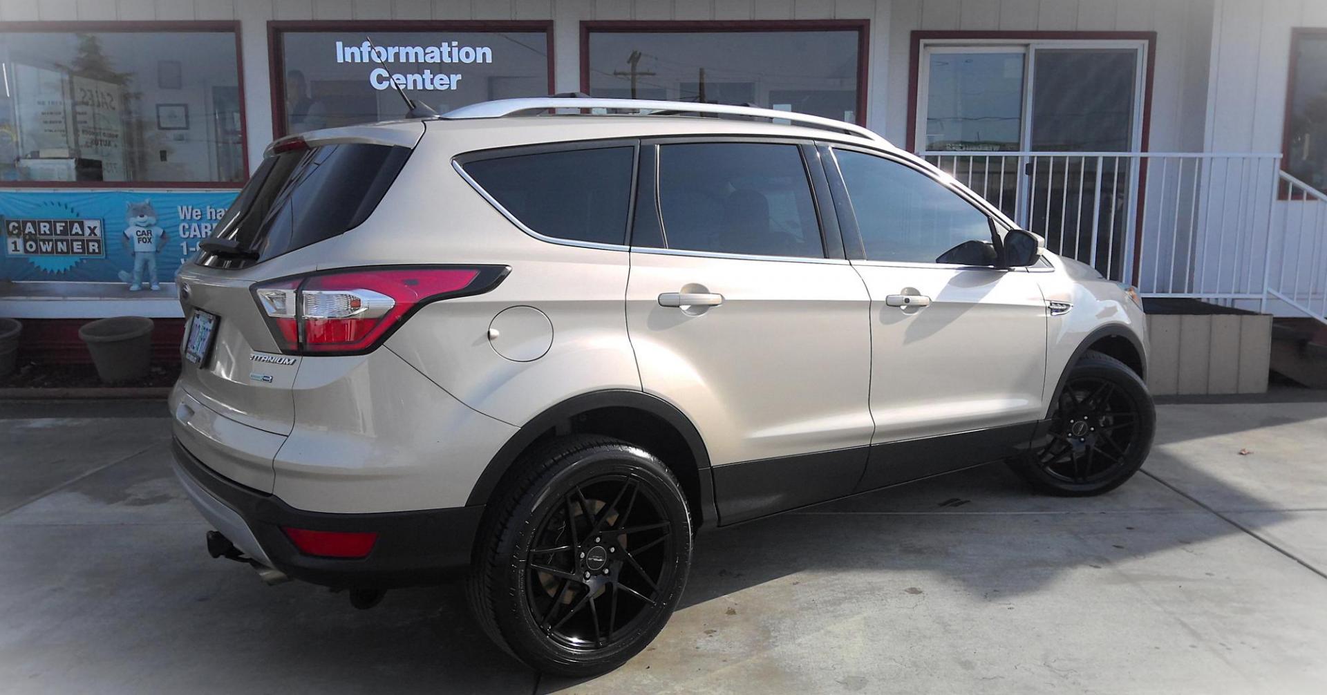 2018 GOLD Ford Escape Titanium 4WD (1FMCU9J96JU) with an 2.0L L4 DOHC 16V engine, 6A transmission, located at 502 S. Riverside Avenue, Medford, OR, 97501, (541) 773-3136, 42.322803, -122.867477 - Photo#2