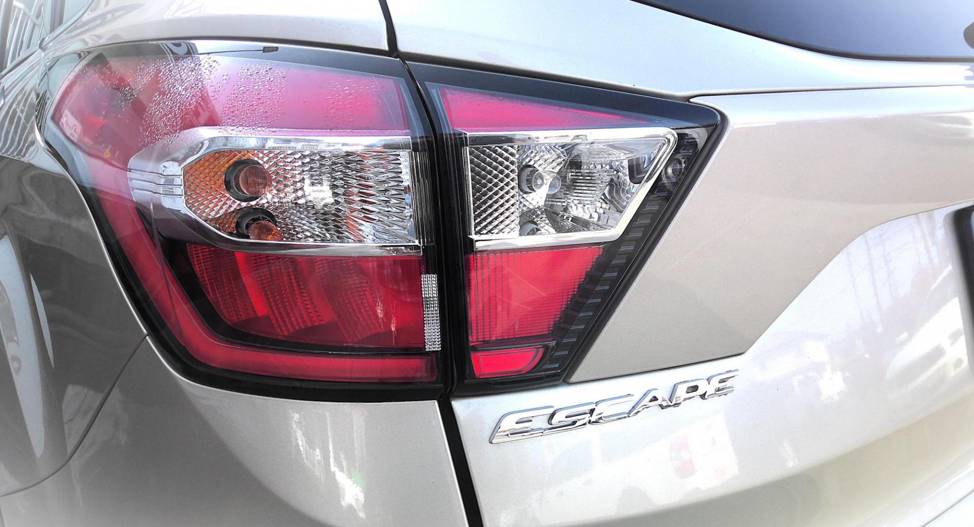 2018 GOLD Ford Escape Titanium 4WD (1FMCU9J96JU) with an 2.0L L4 DOHC 16V engine, 6A transmission, located at 502 S. Riverside Avenue, Medford, OR, 97501, (541) 773-3136, 42.322803, -122.867477 - Photo#4