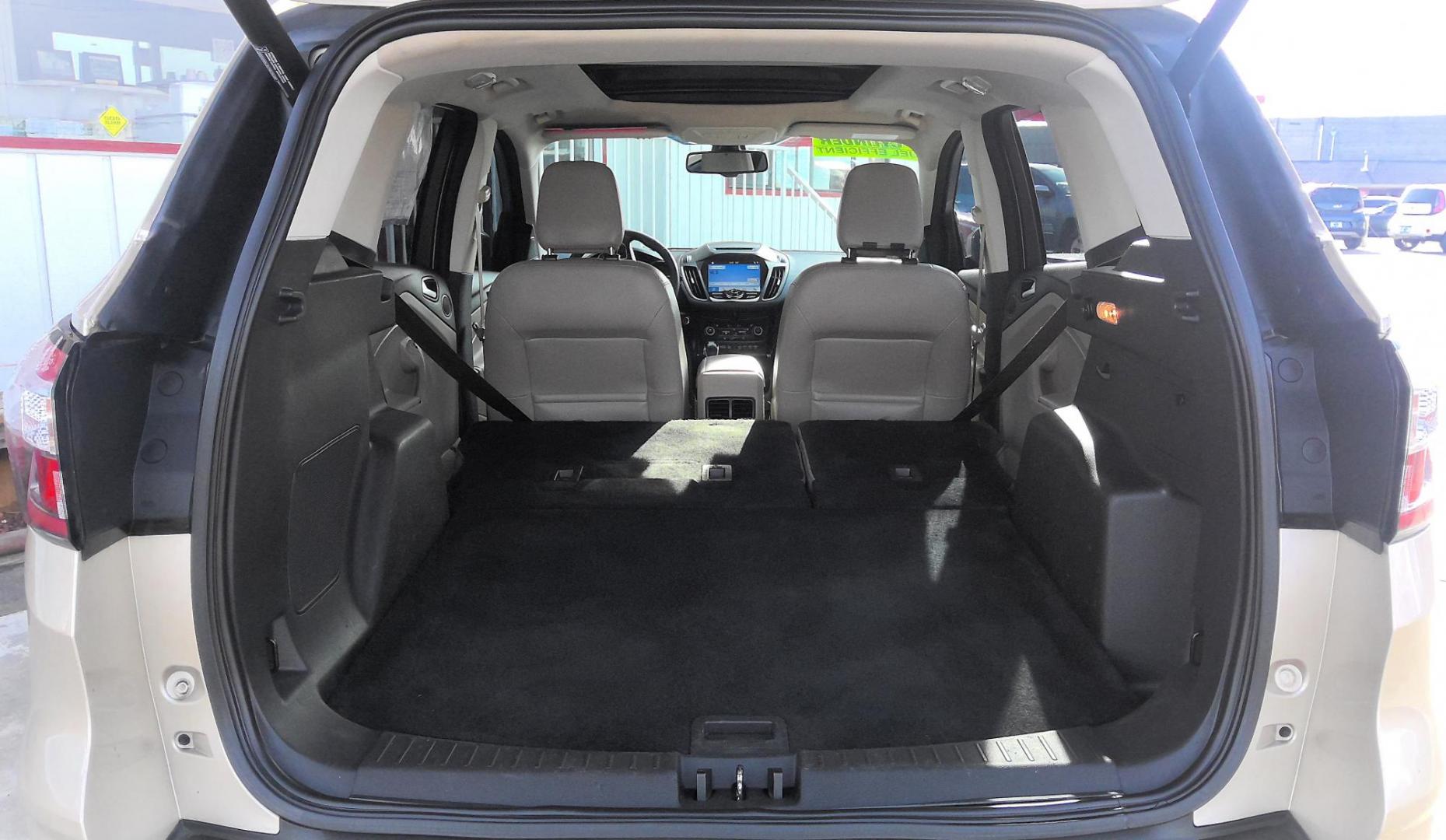 2018 GOLD Ford Escape Titanium 4WD (1FMCU9J96JU) with an 2.0L L4 DOHC 16V engine, 6A transmission, located at 502 S. Riverside Avenue, Medford, OR, 97501, (541) 773-3136, 42.322803, -122.867477 - Photo#6