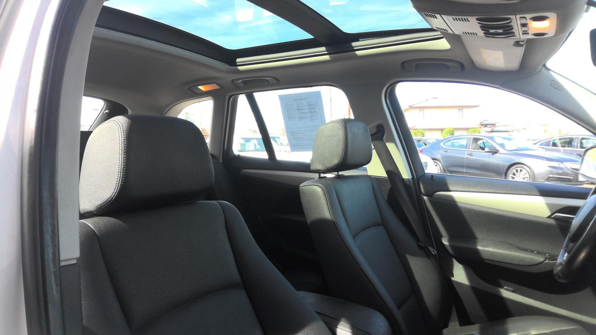 2014 WHITE BMW X1 xDrive28i (WBAVL1C59EV) with an 2.0L L4 DOHC 16V engine, 8-Speed Automatic transmission, located at 502 S. Riverside Avenue, Medford, OR, 97501, (541) 773-3136, 42.322803, -122.867477 - Photo#7