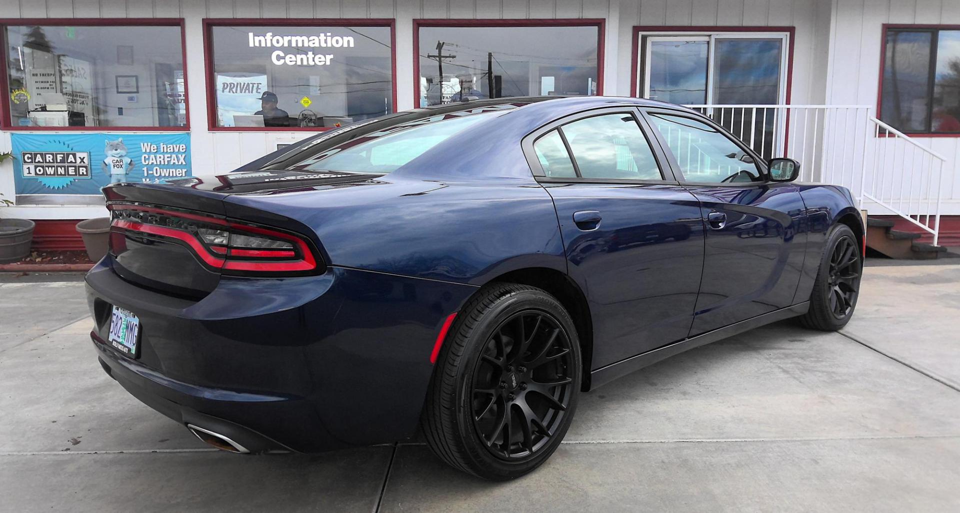 2015 BLUE Dodge Charger SE (2C3CDXBG9FH) with an 3.6L V6 DOHC 24V engine, 8-Speed Automatic transmission, located at 502 S. Riverside Avenue, Medford, OR, 97501, (541) 773-3136, 42.322803, -122.867477 - Photo#2