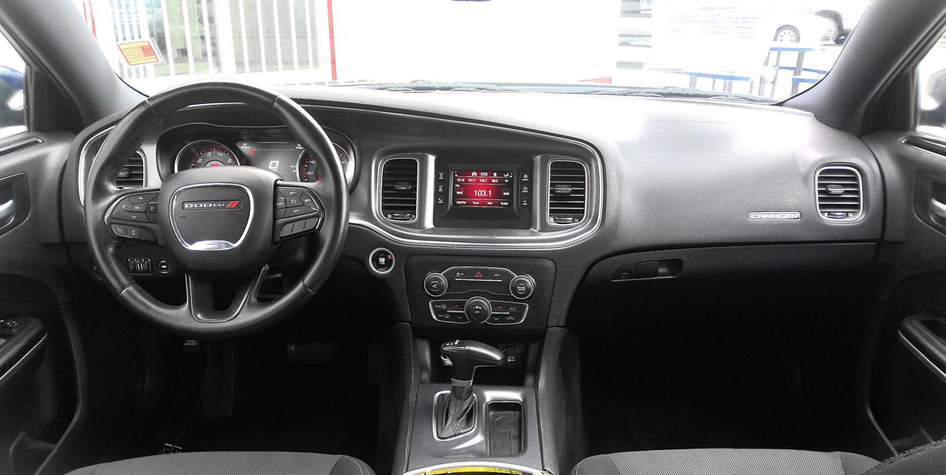 2015 BLUE Dodge Charger SE (2C3CDXBG9FH) with an 3.6L V6 DOHC 24V engine, 8-Speed Automatic transmission, located at 502 S. Riverside Avenue, Medford, OR, 97501, (541) 773-3136, 42.322803, -122.867477 - Photo#5