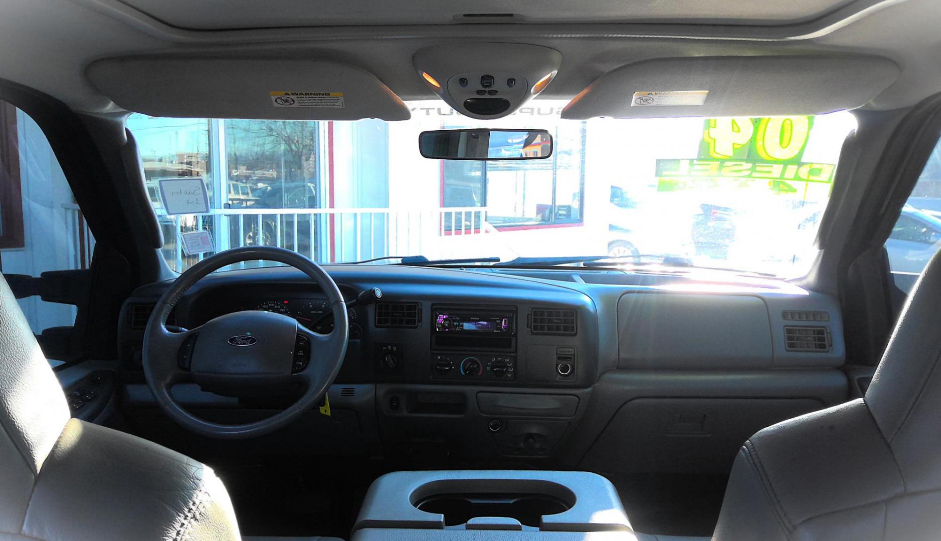 2004 BLACK Ford F-350 SD Lariat Crew Cab 4WD (1FTSW31P64E) with an 6.0L V8 OHV 32V TURBO DIESEL engine, located at 502 S. Riverside Avenue, Medford, OR, 97501, (541) 773-3136, 42.322803, -122.867477 - Photo#5