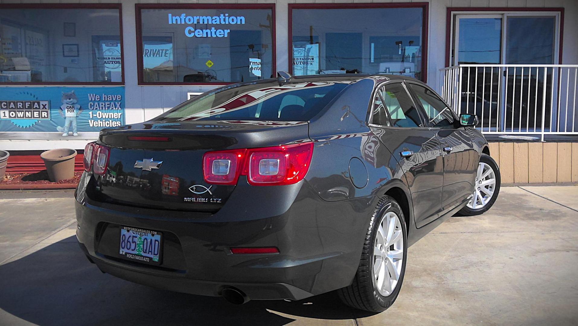 2015 GRAY Chevrolet Malibu 1LTZ (1G11F5SL1FF) with an 2.5L L4 DOHC 16V engine, 6-Speed Automatic transmission, located at 502 S. Riverside Avenue, Medford, OR, 97501, (541) 773-3136, 42.322803, -122.867477 - Photo#2